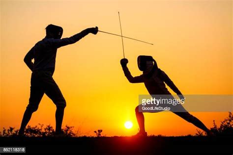 Woman Sword Fighting Photos And Premium High Res Pictures Getty Images