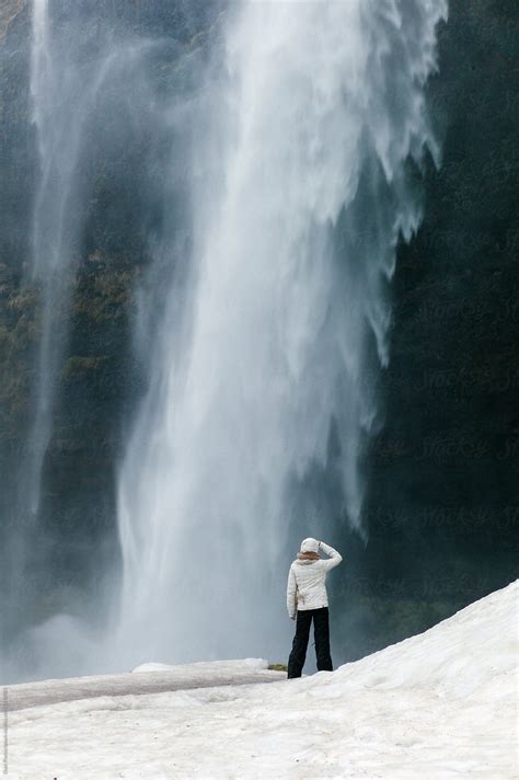 Woman Standing Against Waterfall Del Colaborador De Stocksy Duet Postscriptum Stocksy