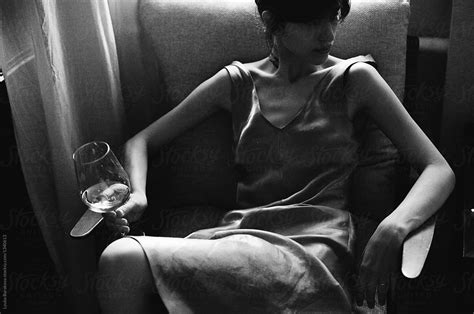 woman with a glass of wine del colaborador de stocksy amor burakova stocksy