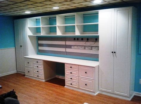 This craft room is filled with fun diy projects to inspire creativity. Craft Center - Traditional - Basement - Baltimore - by ...