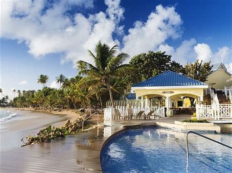 Magdalena Grand Beach And Golf Resort Tobago Book Now With Tropical Sky