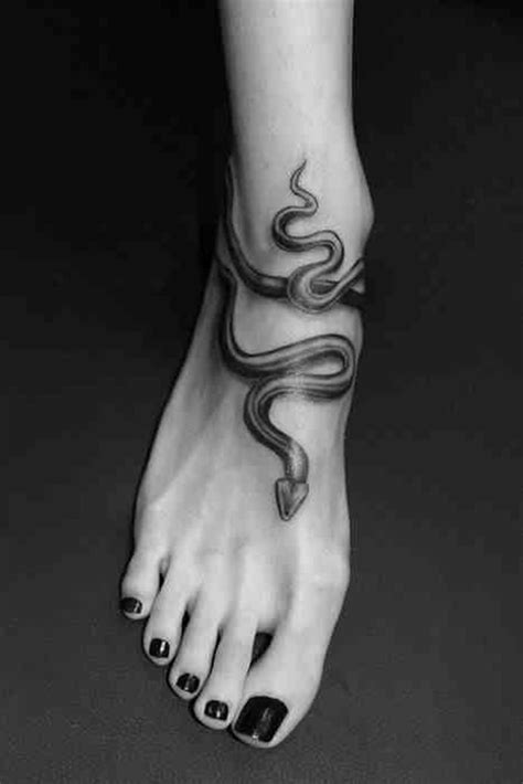 Snake tattoo on arm mind blowing snake tattoo elegant snake tattoos 40 Snake Tattoo Designs And Their Meanings