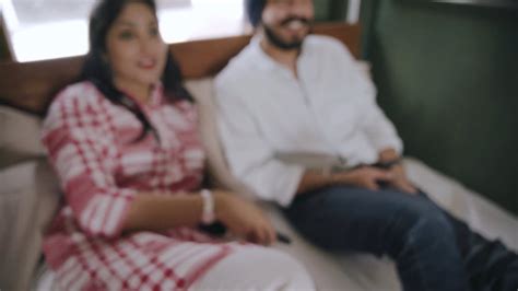 a couple enjoys watching tv · free stock video