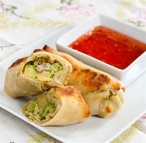Baked avocado rolls, a delicious snack with crispy outside and creamy avocado inside. Baked Avocado Egg Rolls - Baked In