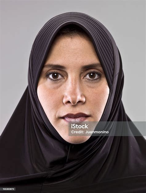 Woman Facing Forward With Serious Expression Stock Photo Download