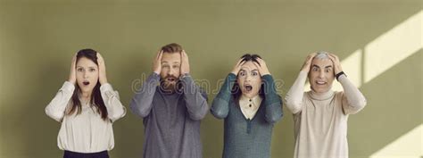 Group Of Adult Men And Women Feeling Surprised Shocked Scared And