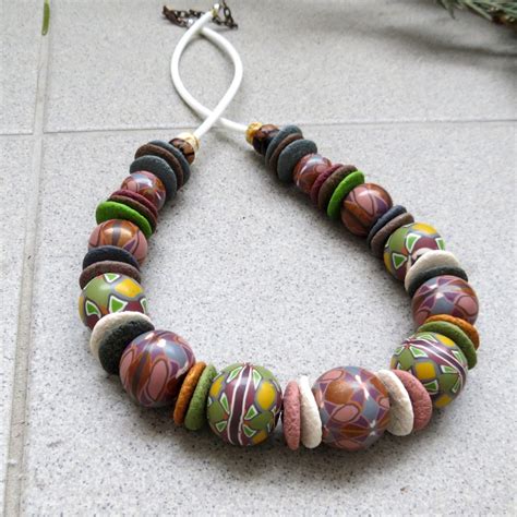 Leave the clay for 24 hours to set. polymer clay bead - canes necklace fimo - diy jewelry