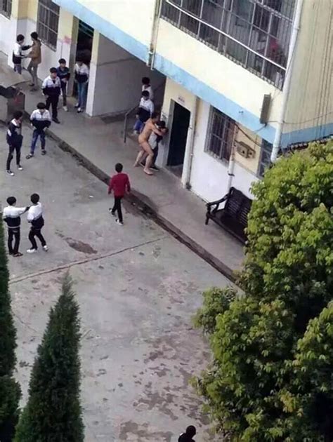 Chinese Teacher Strips Naked In Playground And Tries To