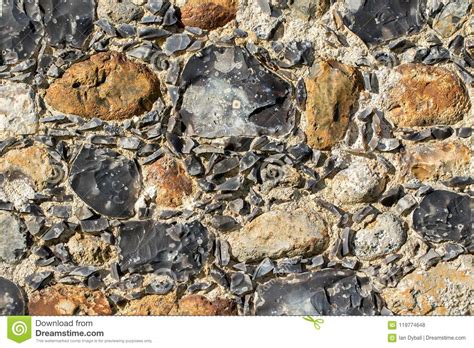 Ancient Flint Stone Wall Surface Close Up Abstract Background I Stock