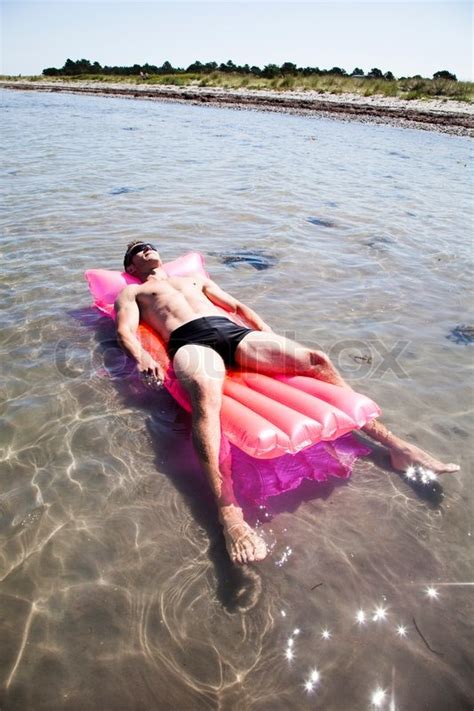 A Caucasian Man Sunbathing While Lying Stock Image Colourbox