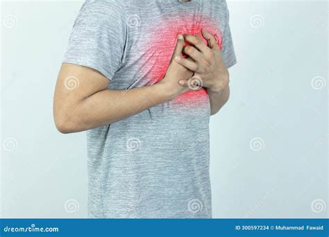 Asian Man Pressing Chest With Painful Expression Severe Heartache