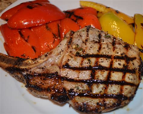 Center cut pork chops with pesto and red pepper flakes are a delicious way to enjoy pork chops; Grilled Center Cut Pork Chops with Bell Peppers