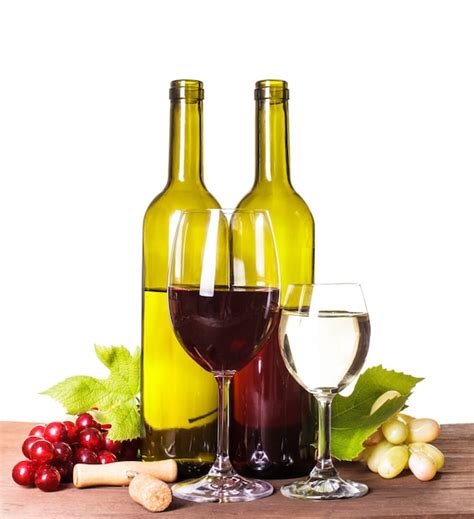 Premium Photo Red And White Wine In Bottles And Glass On The Wooden Table