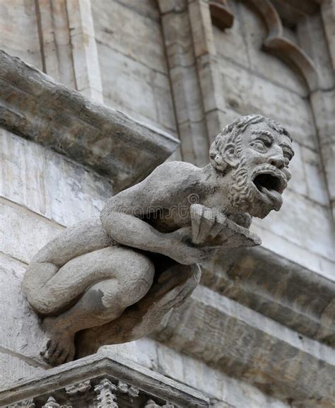 Monstrous Statue With Almost Human Features Called Gargoyle On The