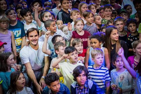 The girls also play a little bit, the world no. Roger federer — Roger with children from the RF foundation ...