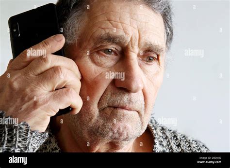 Old Hand Holding Mobile Phone Hi Res Stock Photography And Images Alamy
