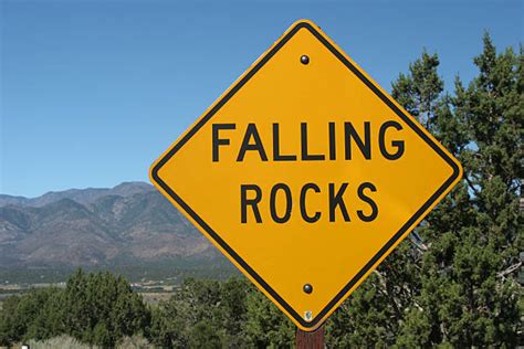 Best Falling Rock Sign Stock Photos Pictures And Royalty Free Images
