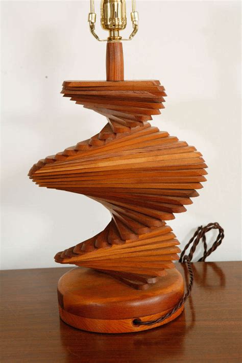 Bring both function and fashion to any tabletop in your home with this modern table lamp. Mid-Century French Helix Wood Table Lamp at 1stdibs