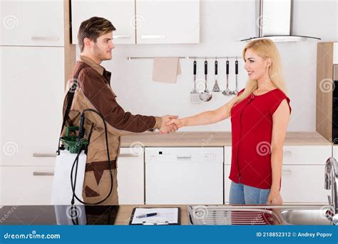 Woman Shaking Hands With Pest Control Worker Stock Photo Image Of