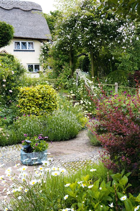 9 traditional cottage garden ideas real homes backyard garden layout backyard garden