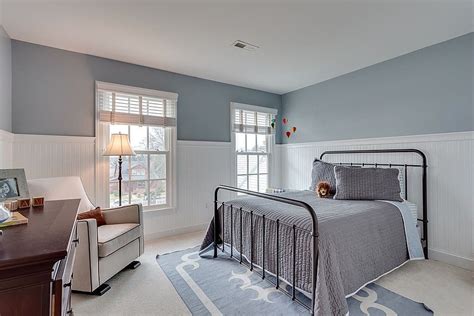 Cottage Guest Bedroom With Wainscoting Carpet Dining Room