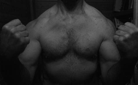 flexing big bulging biceps a muscular all natural bodybuil… flickr