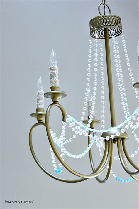 Wood beads are draped in overlapping layers for a graceful yet. Beaded Chandeliers Reveal Their Charm and Versatility