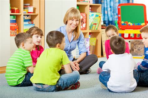 Teacher Discussing With Children Stock Photo Download Image Now Istock