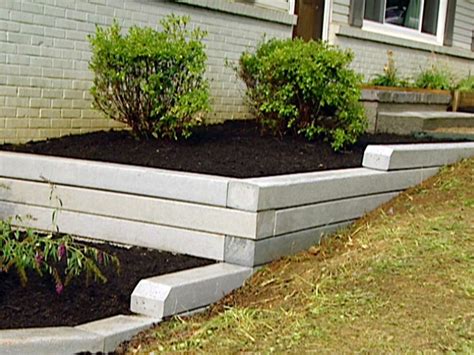 However, wood retaining walls can be constructed very easily with a few simple tools and some basic woodworking skills. How to Install a Timber Retaining Wall | HGTV