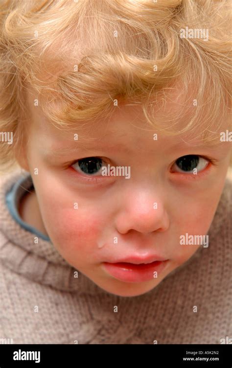 Sad Faced Little Boy Stock Photo Alamy