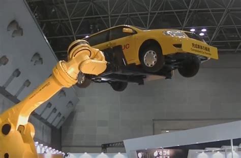 Fanuc Robotic Arm Lifting A Car Robotic Gizmos