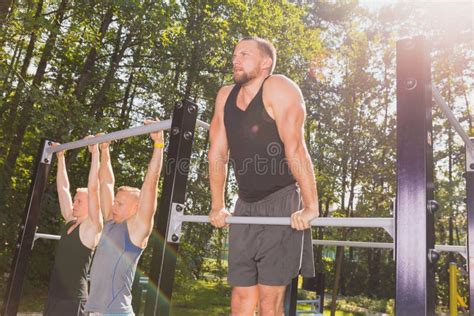 Men Doing Pull Ups Stock Photo Image Of Muscles Lifestyle 88642360
