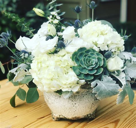 Check spelling or type a new query. Blue thistle, white hydrangeas, and succulent table ...