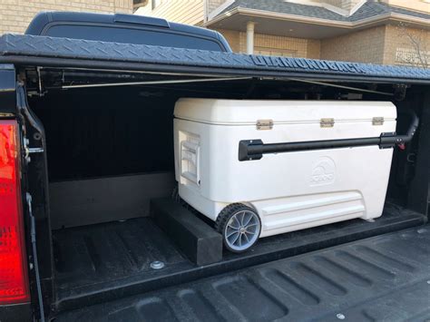 Lay out all the tools and other items to be stored the truck box will feature long drawers separated and supported by vertical dividers, flanked by wing boxes with smaller drawers. diy truck bed divider - Do It Your Self