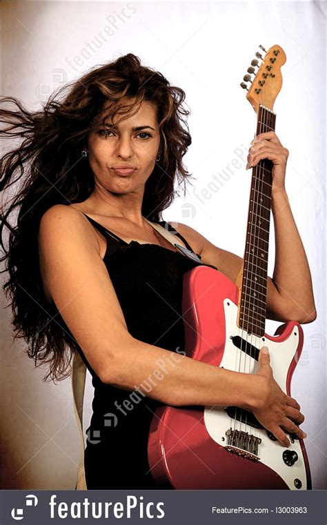 Artists Female Rock Star With The Guitar Stock Picture