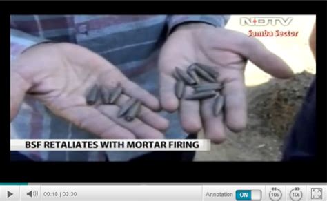 Villagers Display Shrapnel From Indian Mortar Fire At Tahir Joian