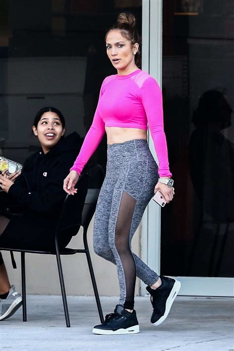 Jennifer Lopez Wore A Bright Pink Crop Top And Grey Leggings As She Leaves The Ufc Gym In Miami