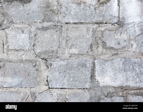 Old Wall Of Concrete Block Masonry Closeup Grunge Rough Cement Texture