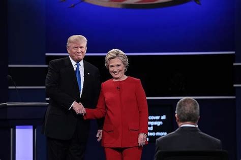 Watch Hillary Clinton Practice Ducking Unwanted Trump Hug During