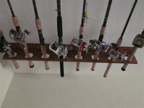 The other rack will hold the rod handle, so cushioning isn't necessary. DIY Ceiling Mounted Fishing Rod Holder — Florida Sportsman