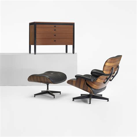 A few fine scratches in the blackened area of 106: CHARLES AND RAY EAMES, 670 lounge chair and 671 ottoman