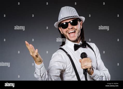 Funny Singer With Microphone At The Concert Stock Photo Alamy