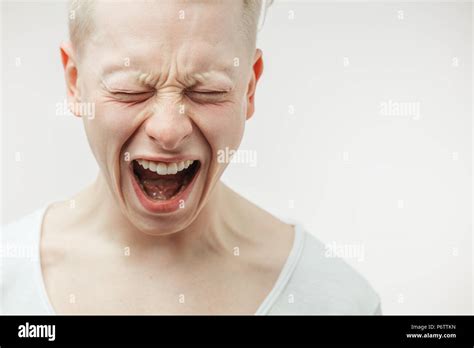 Closeup Dramatic Emotional Portrait Of Desperate Enraged Young Man