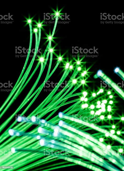 Bundle Of Optical Fibers With Green Light Stock Photo Download Image