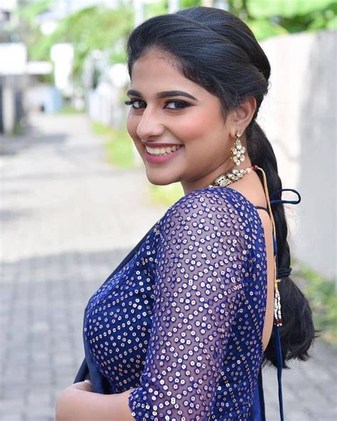 malayalam actress nayanthara chakravarthy exclusive half saree hot and sexy photoshoot
