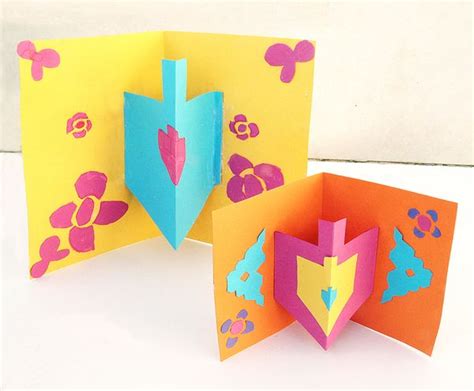 Prepare the card and mat take your card, confirm the orientation of your card before you place it on your mat. Hanukkah Card Craft With 3D Dreidel - creative jewish mom