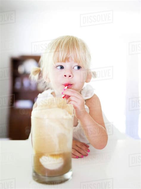 Girl 2 3 Drinking Milkshake Stock Photo Dissolve
