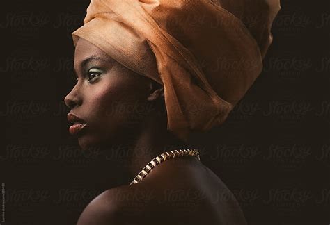 African Woman With An Orange Turban By Stocksy Contributor Lumina Stocksy