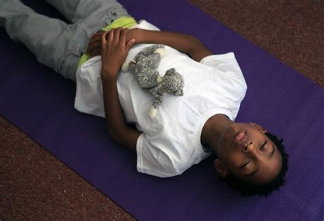 Yoga offers a plethora of benefits for both adults and children, including improved mental focus, enhanced discipline, physical fitness, better. Yoga and dogs bring calm to school for troubled kids | APM ...