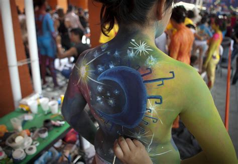 An Artist Paints A Womans Body During The 6th International Fonambules